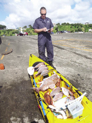 snapper in kayak